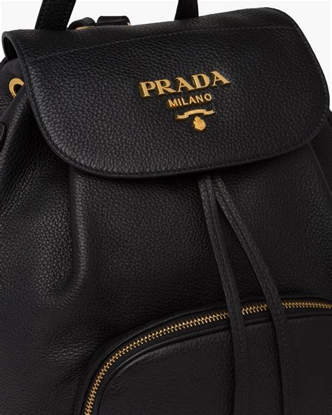 prada leather nude clutch|Prada leather backpack.